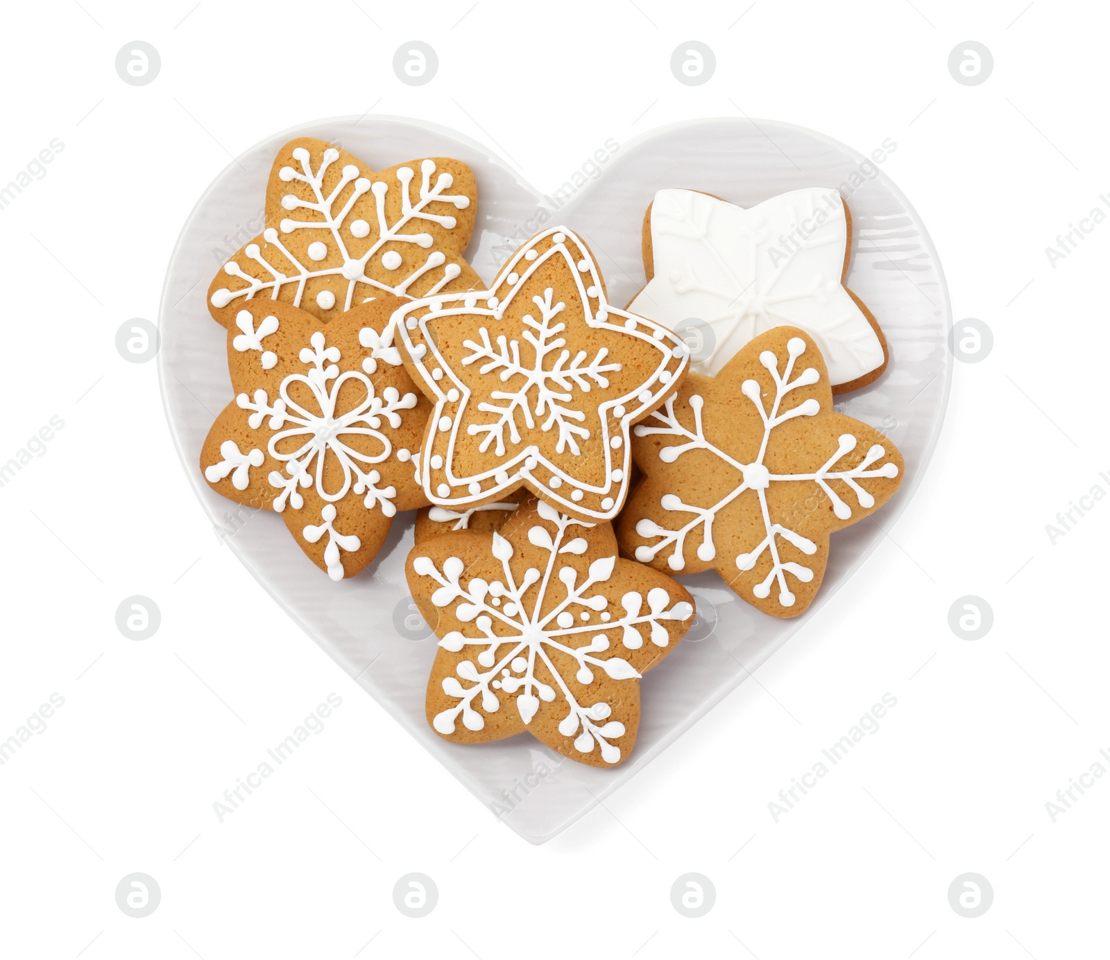 Photo of Tasty star shaped Christmas cookies with icing isolated on white, top view