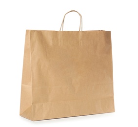 Photo of Paper shopping bag isolated on white. Mock up for design