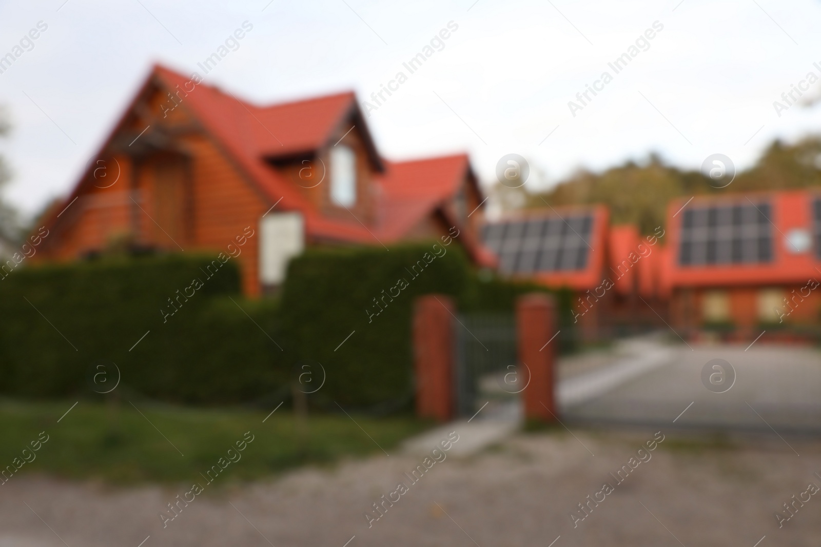 Photo of Beautiful houses outdoors, blurred view. Real estate for rent