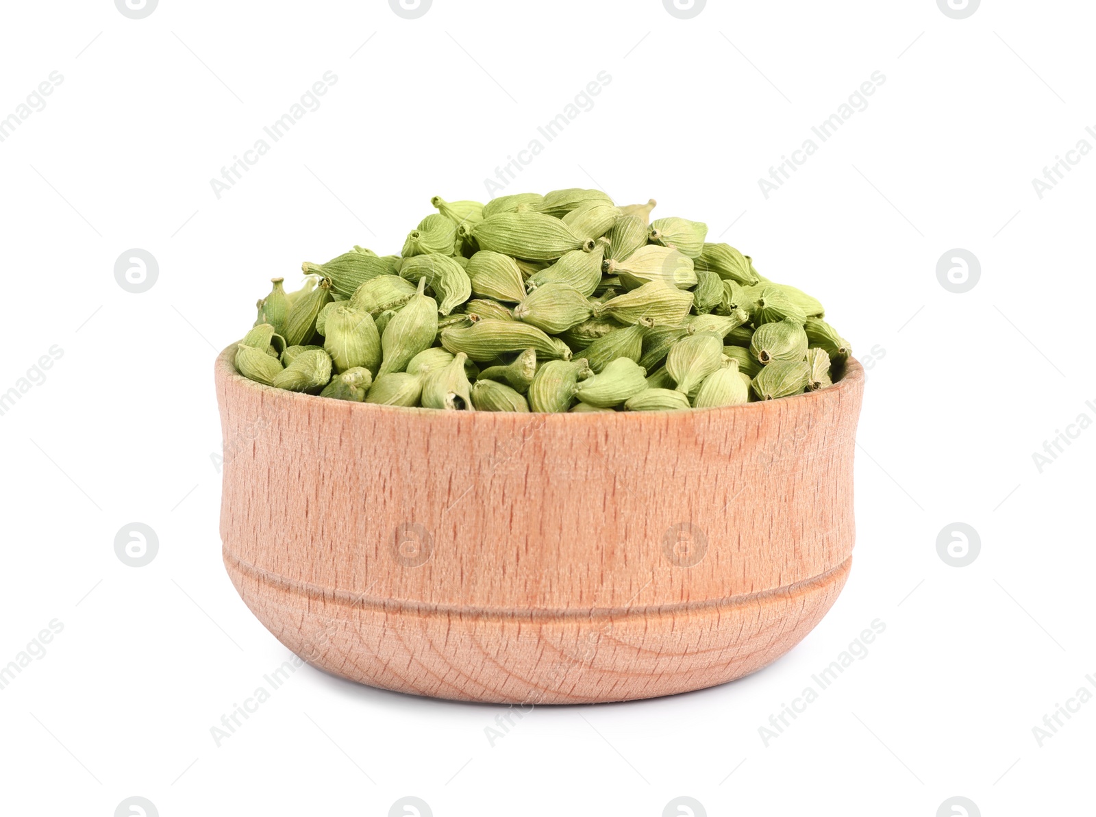 Photo of Wooden bowl with dry cardamom seeds isolated on white