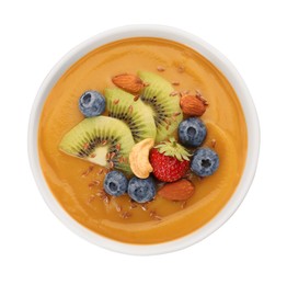 Photo of Delicious smoothie bowl with fresh berries, kiwi and nuts on white background, top view