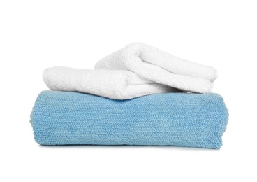 Photo of Folded soft terry towels on white background