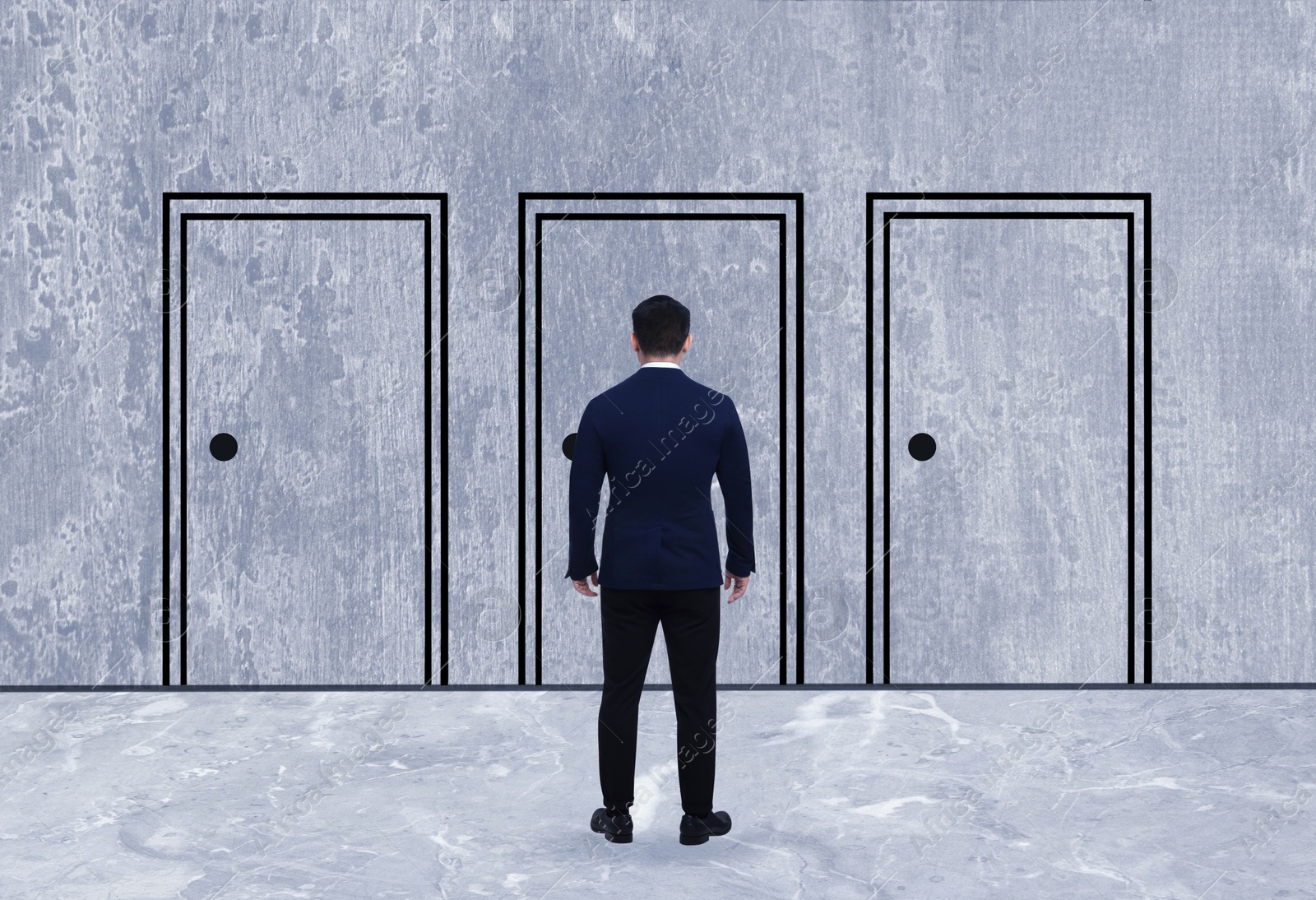 Image of Man standing in front of drawn doors, back view