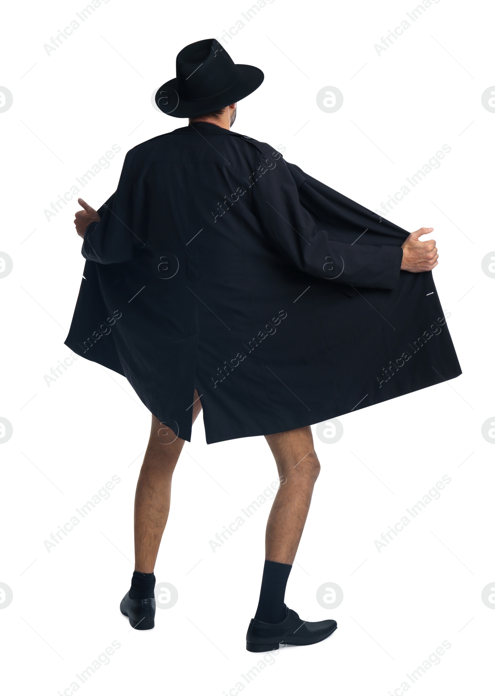 Photo of Exhibitionist exposing naked body under coat isolated on white, back view