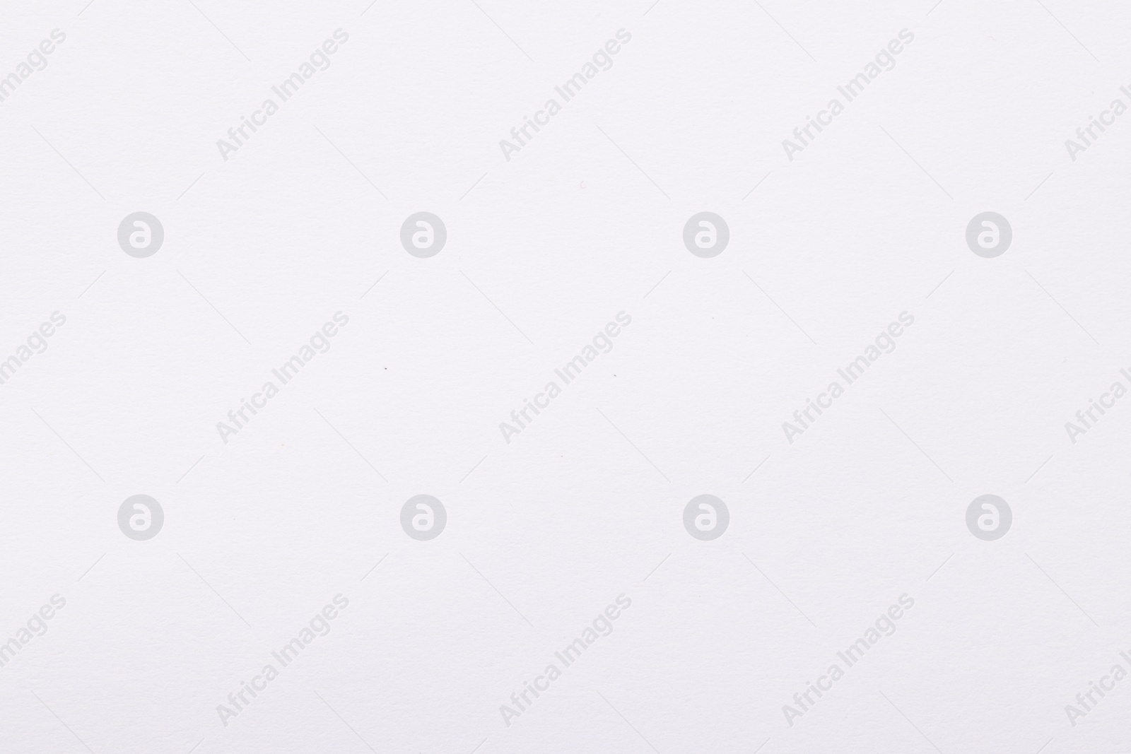 Photo of Texture of white paper sheet as background, top view