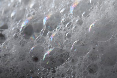 Photo of Closeup view of white fluffy washing foam