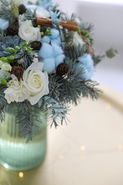 Beautiful wedding winter bouquet on table indoors