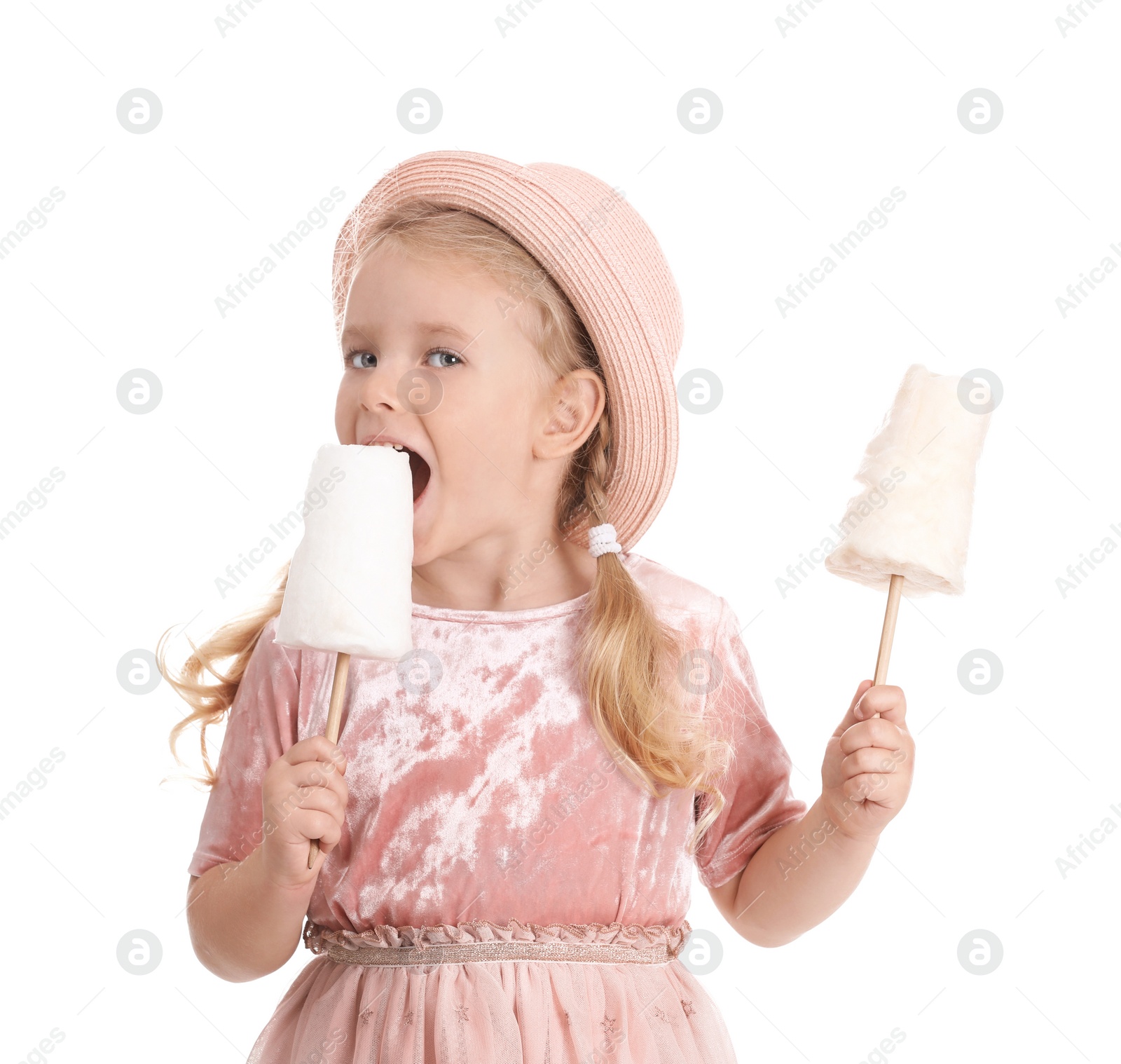 Photo of Cute little girl with cotton candies on white background