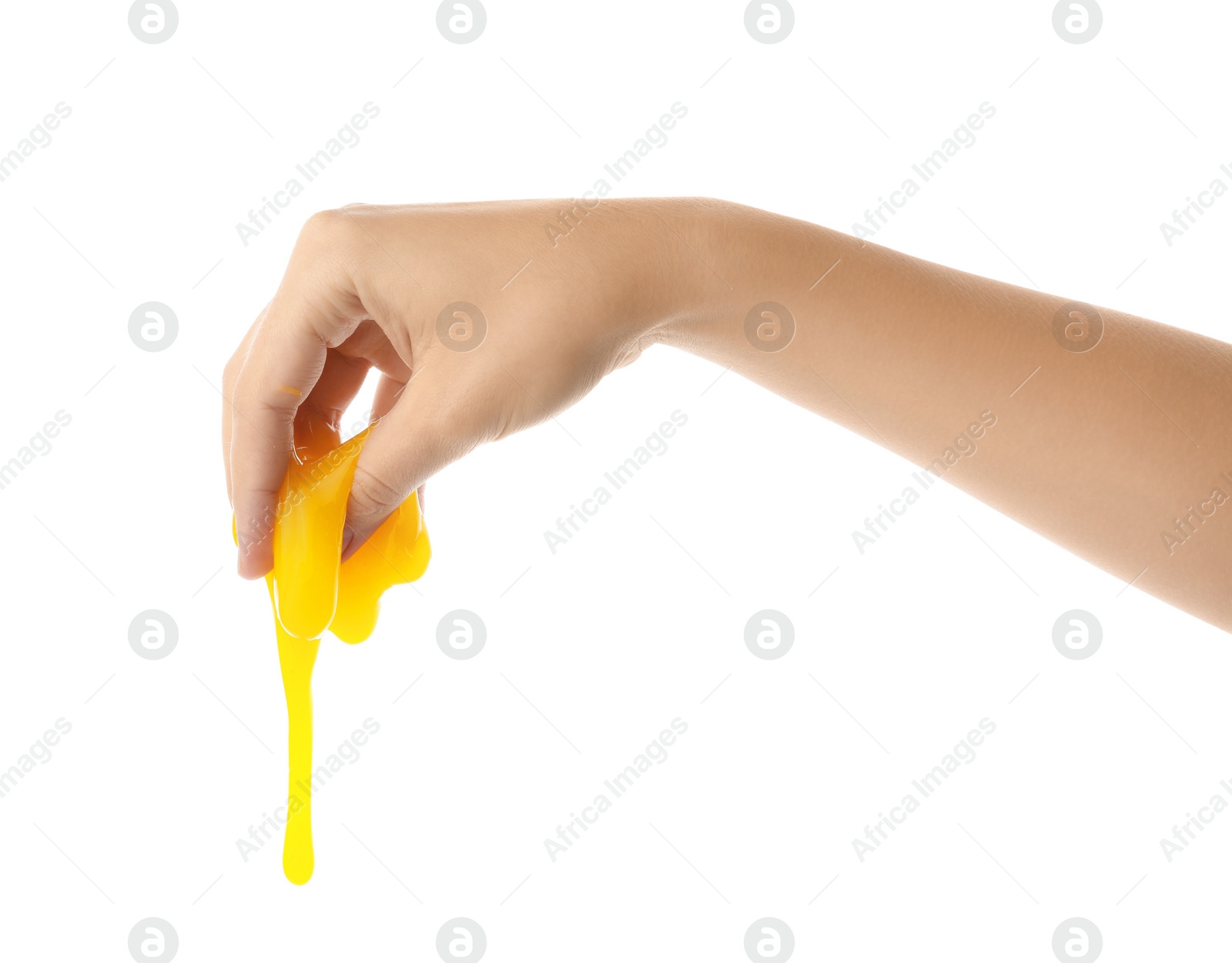 Photo of Woman playing with yellow slime isolated on white, closeup. Antistress toy