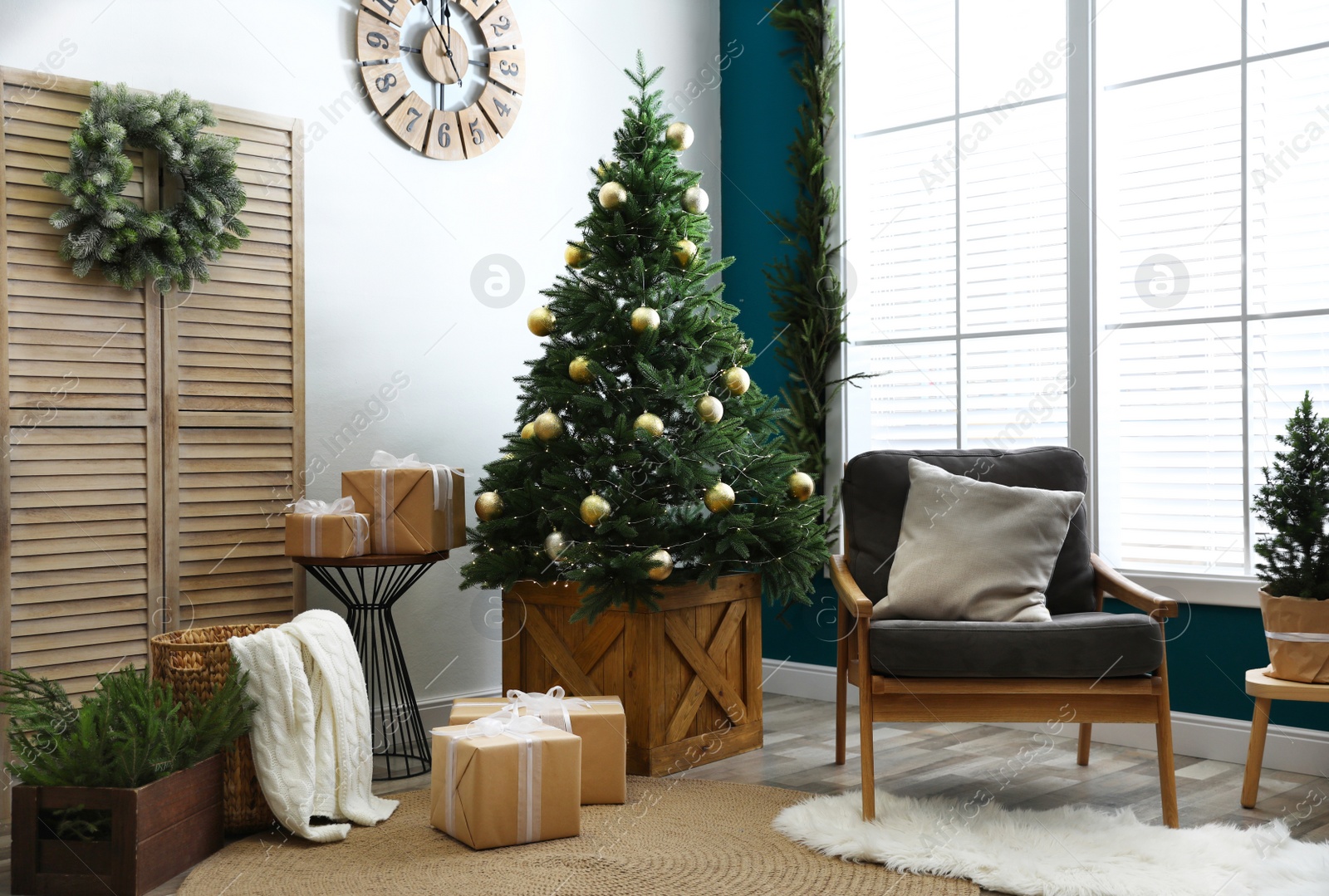Photo of Beautiful interior with decorated Christmas tree in living room