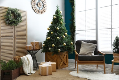 Beautiful interior with decorated Christmas tree in living room