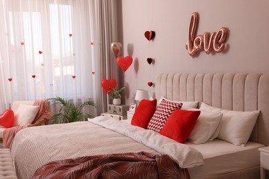 Cozy bedroom decorated for Valentine Day. Interior design