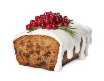 Photo of Traditional Christmas cake with cranberries and icing isolated on white. Classic recipe