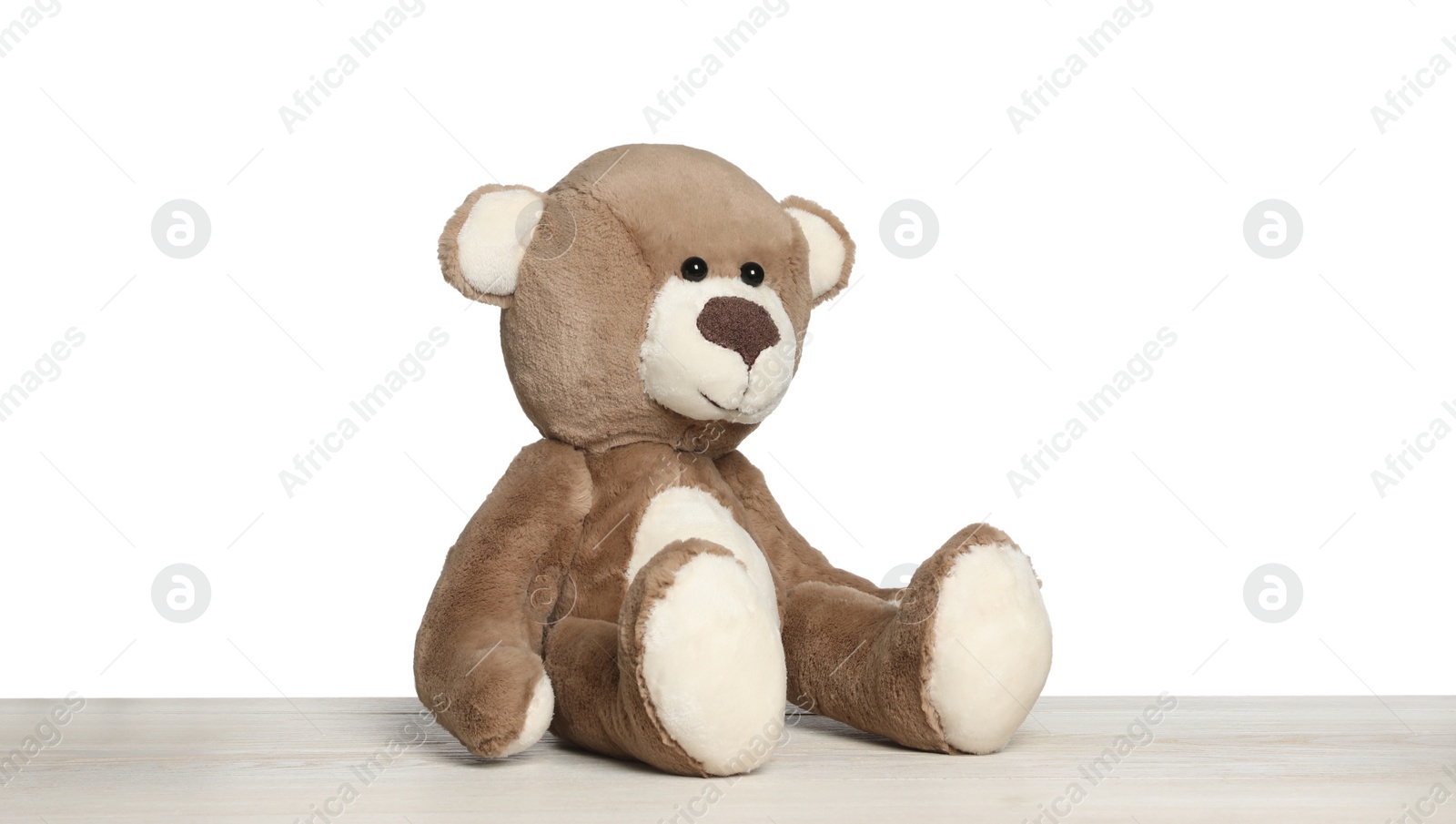 Photo of Cute teddy bear isolated on white. Child`s toy