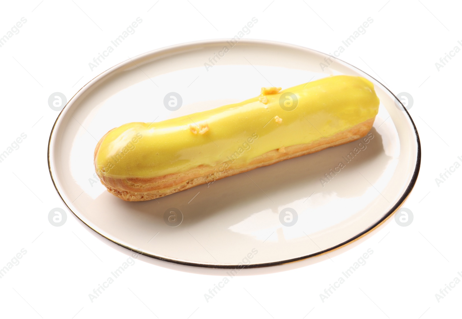 Photo of Delicious eclair covered with yellow glaze isolated on white