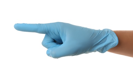Photo of Person in blue latex gloves pointing at something against white background, closeup on hand