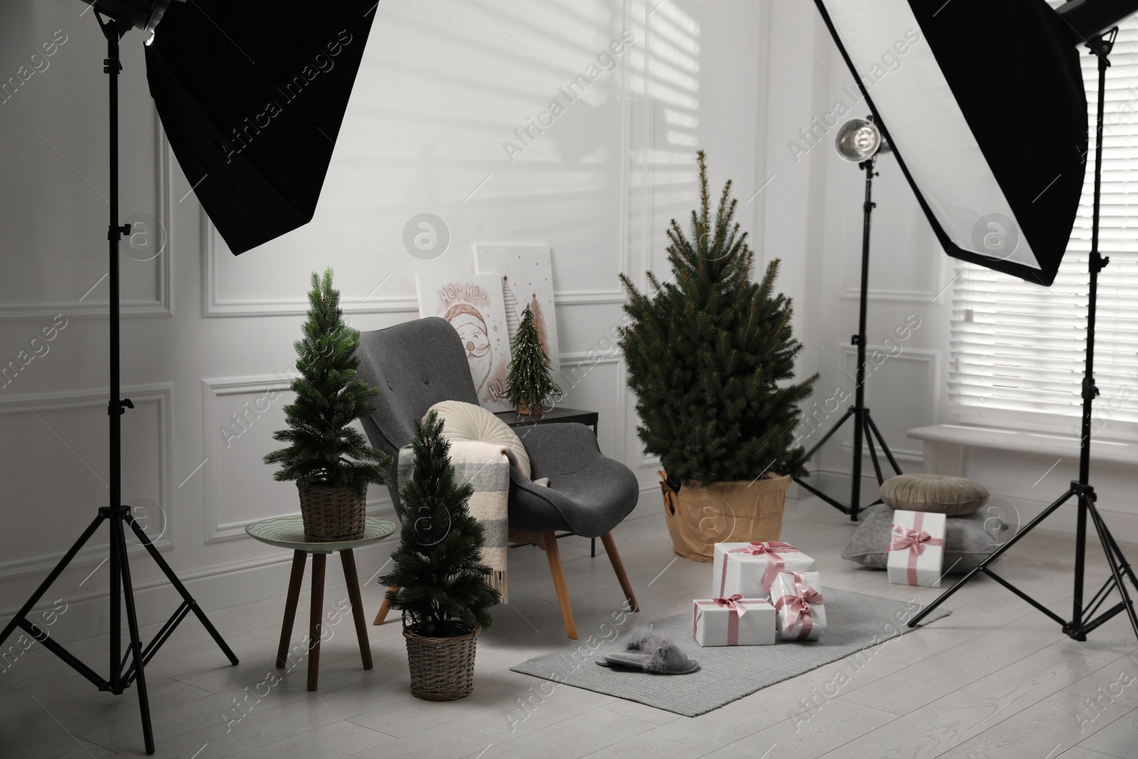 Photo of Beautiful Christmas themed photo zone. Cozy living room interior imitation