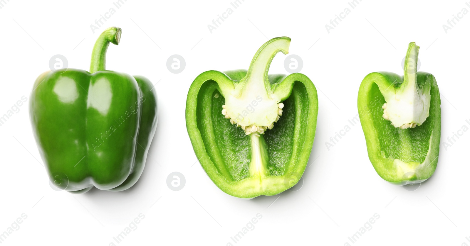 Photo of Whole and cut green bell peppers on white background, top view