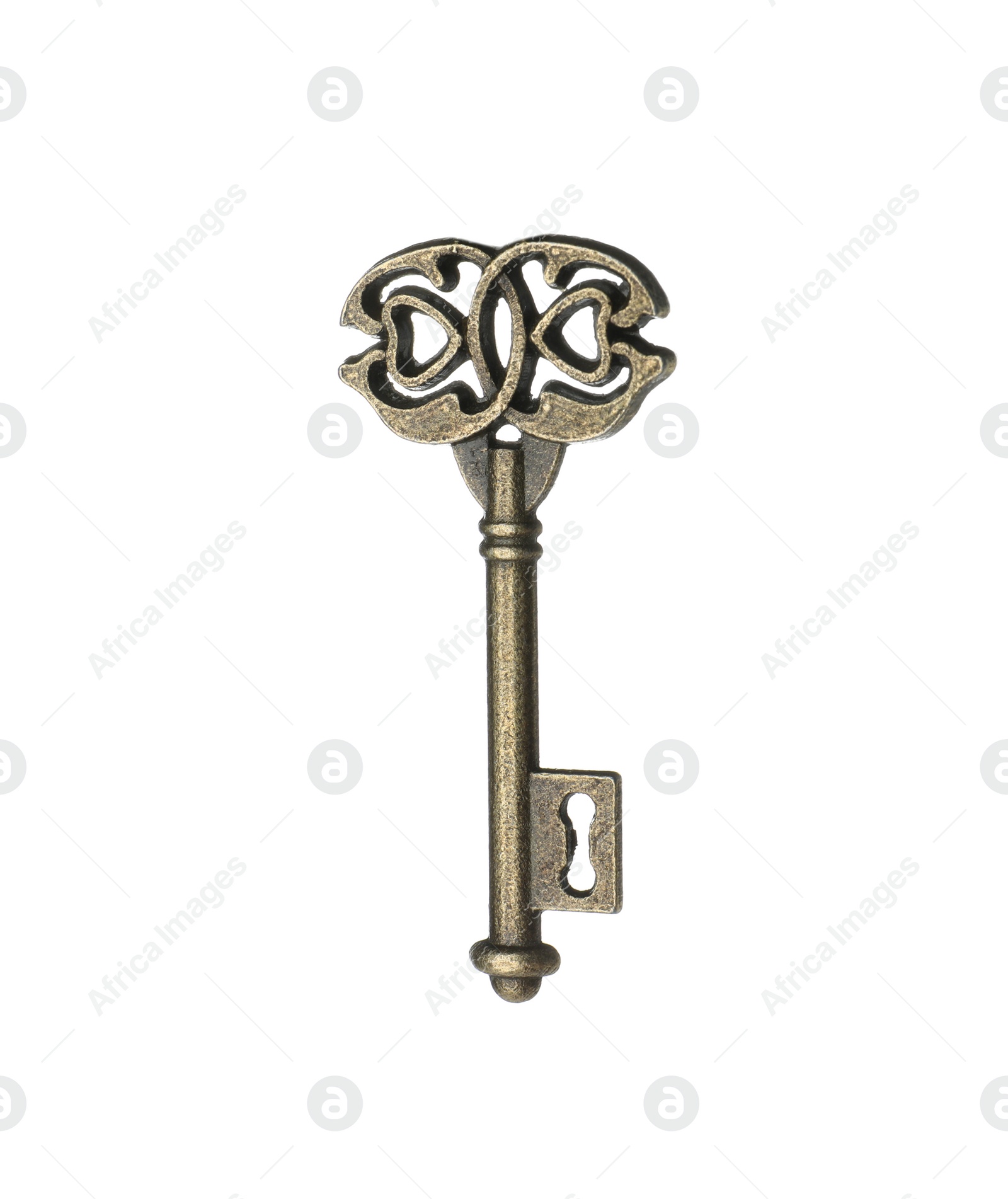 Photo of Bronze vintage ornate key on white background