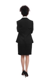 Businesswoman in suit on white background, back view