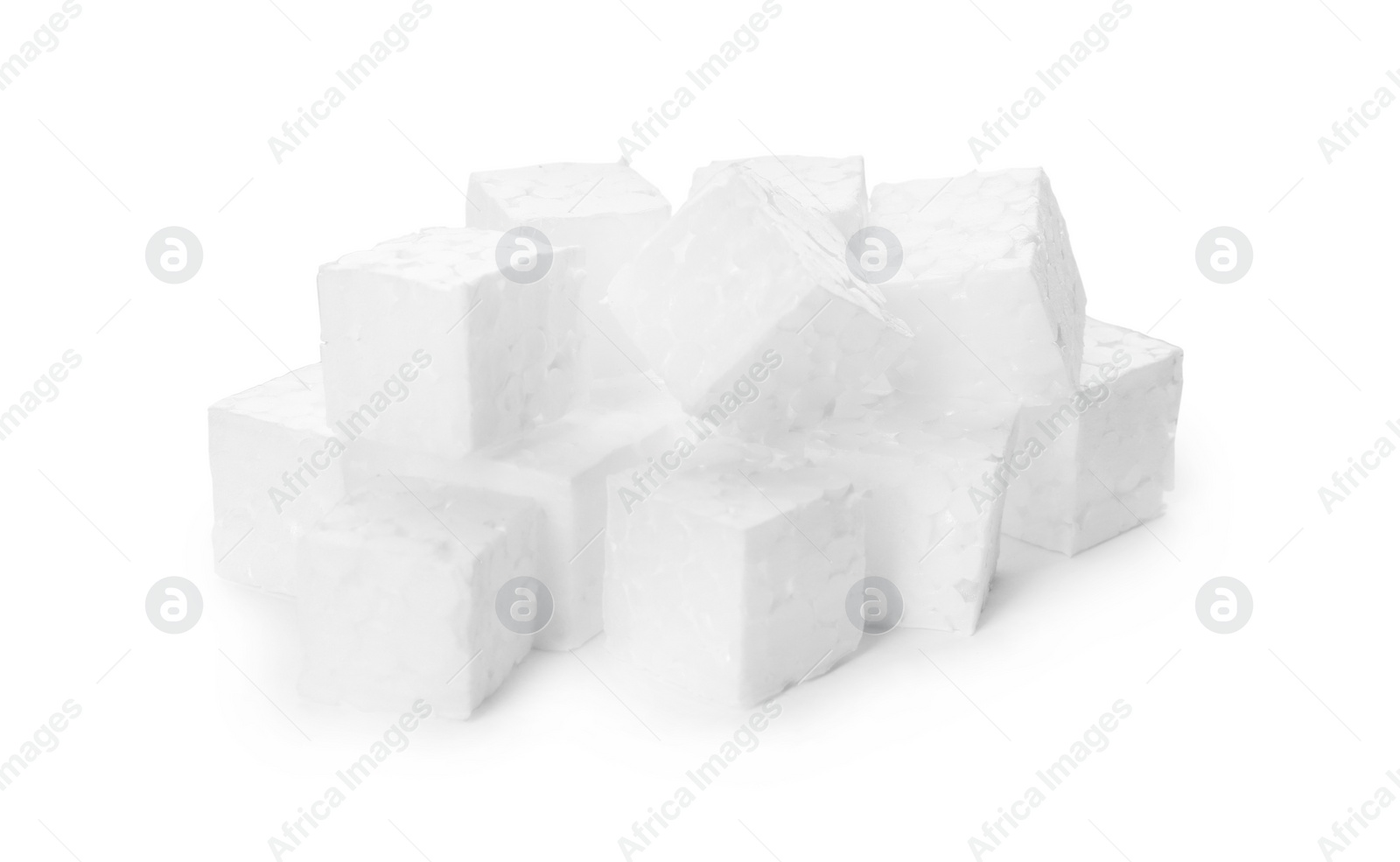 Photo of Pile of styrofoam cubes on white background