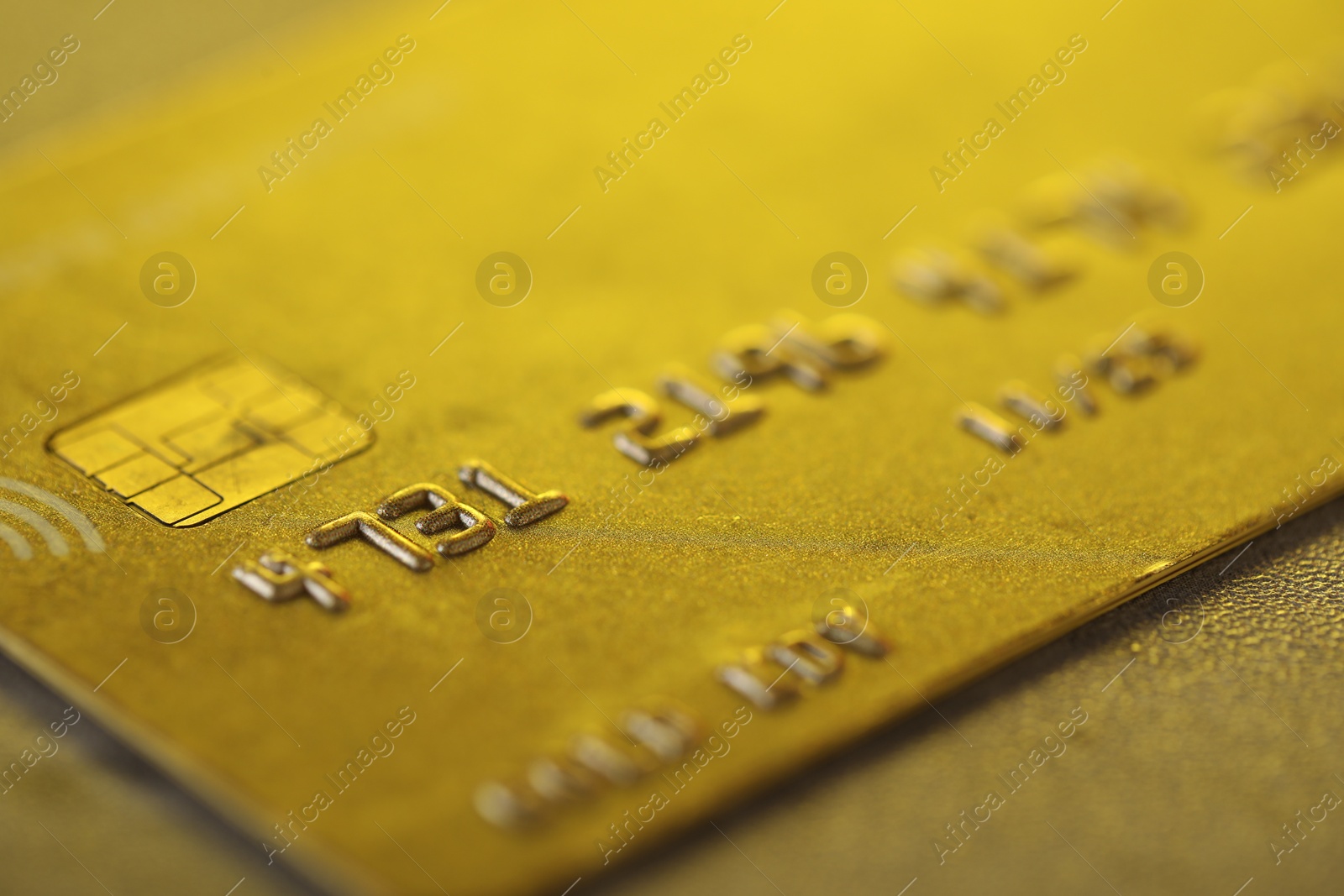 Photo of Plastic credit card on table, macro view