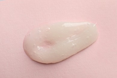 Photo of Sample of scrub on pink background, top view
