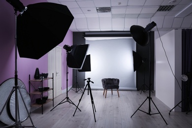 Interior of modern photo studio with professional equipment