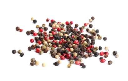Photo of Heap of mixed peppercorns isolated on white