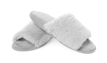 Photo of Pair of soft slippers with fur isolated on white