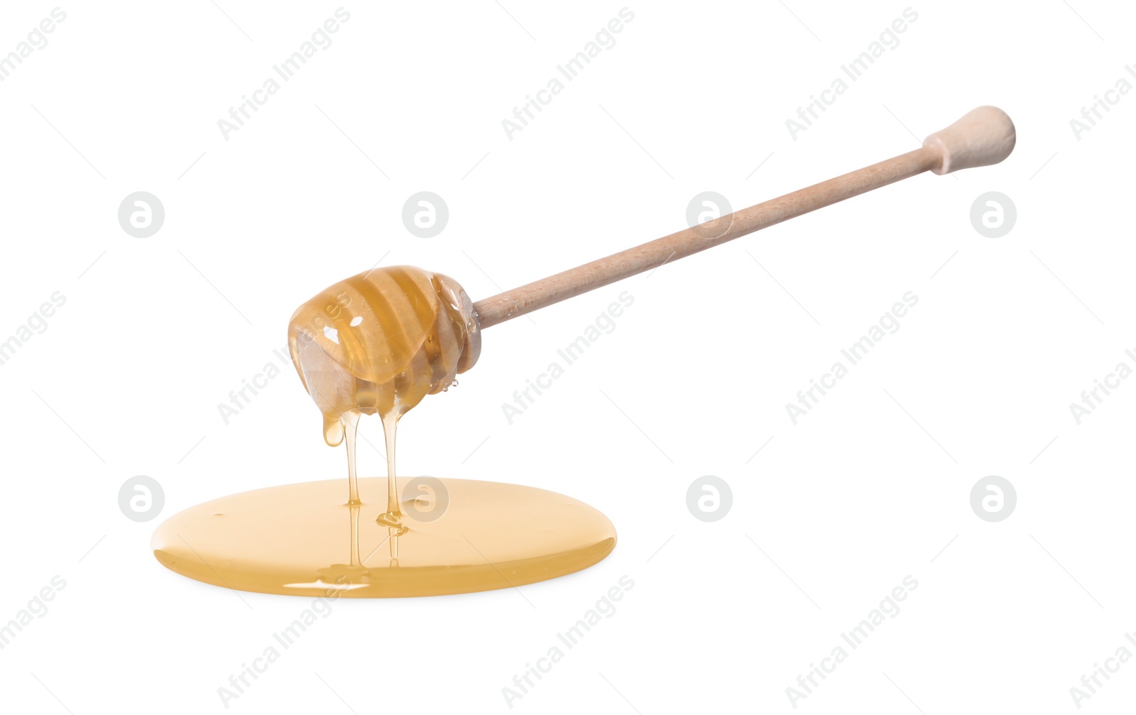 Photo of Natural honey dripping from dipper on white background