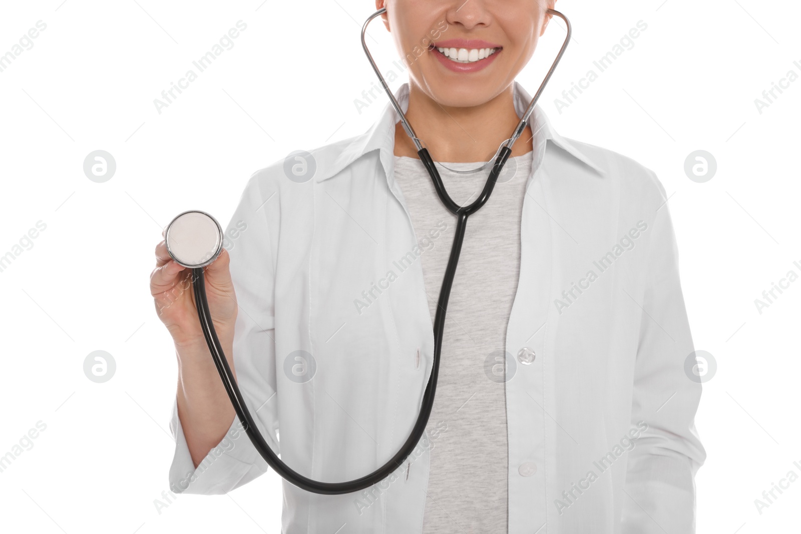 Photo of Medical doctor with stethoscope isolated on white, closeup