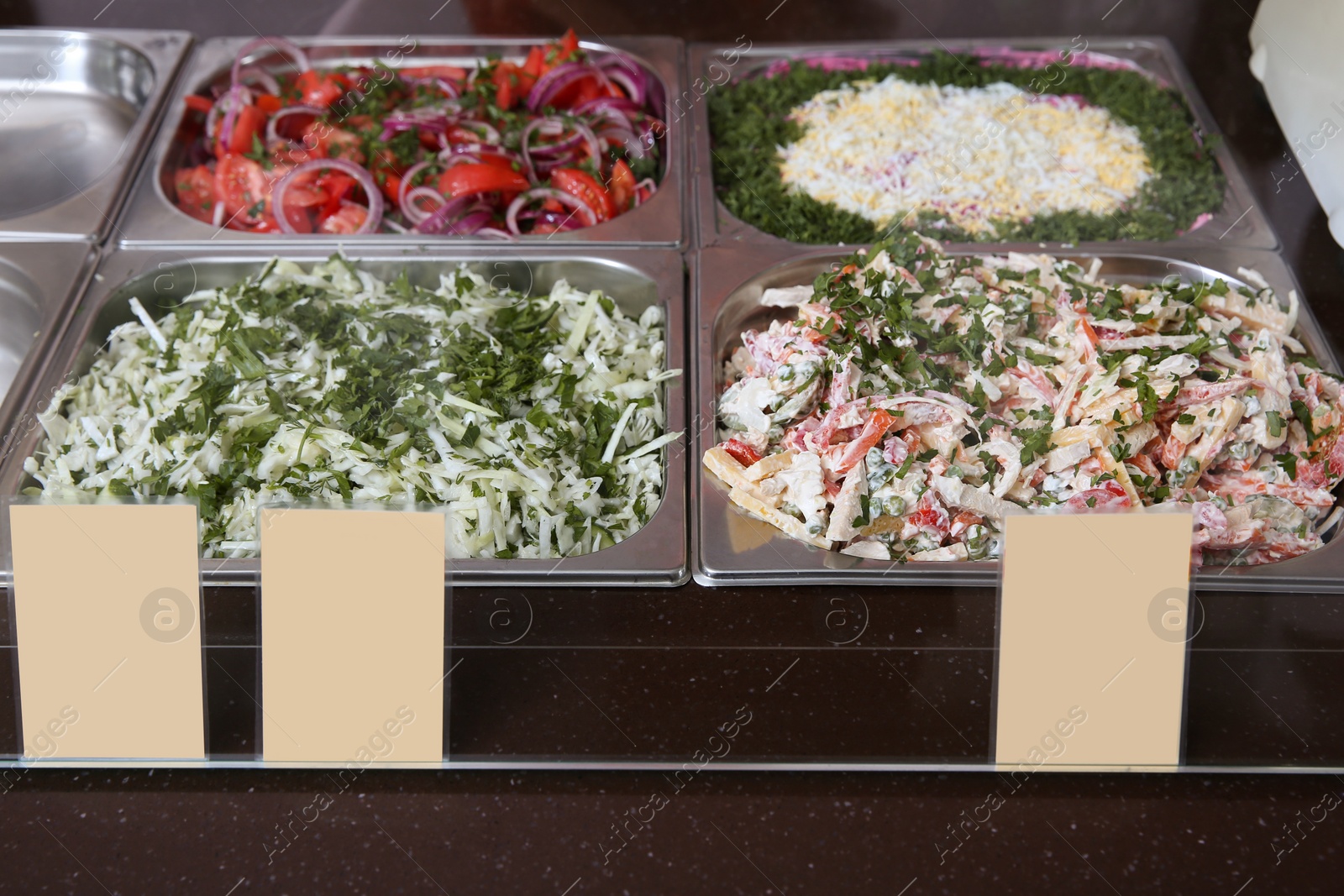 Photo of Containers with healthy food in school canteen