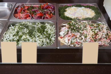 Containers with healthy food in school canteen