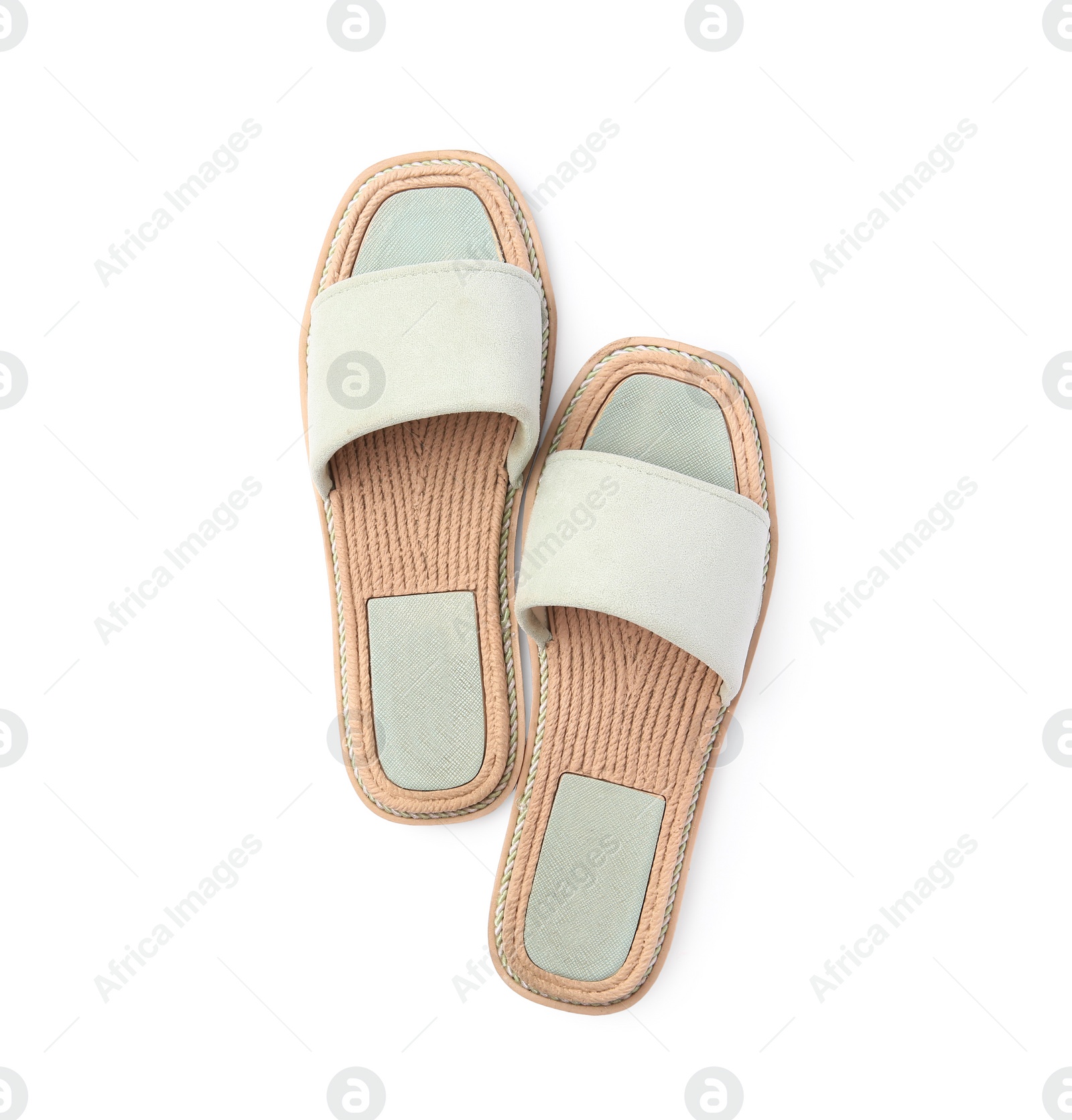 Photo of Stylish light grey slippers isolated on white, top view