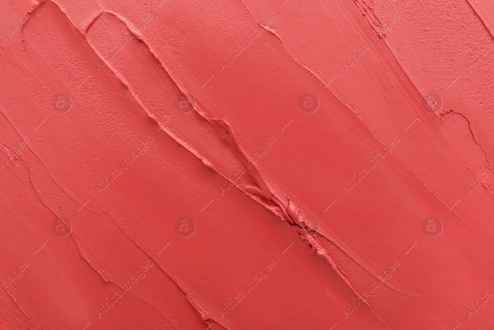 Photo of Texture of lipstick as background, top view