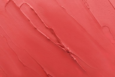 Photo of Texture of lipstick as background, top view