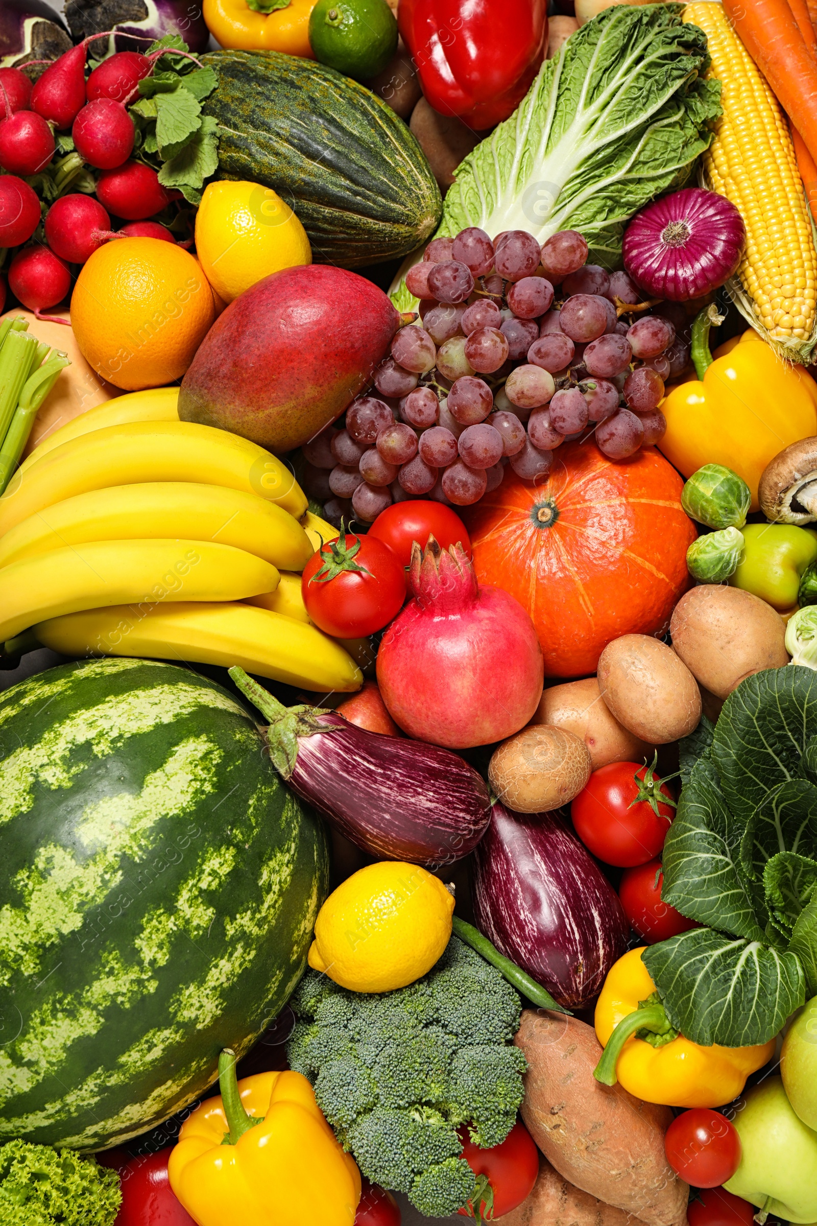 Photo of Assortment of organic fresh fruits and vegetables as background, closeup