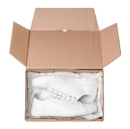 Box with pair of shoes on white background