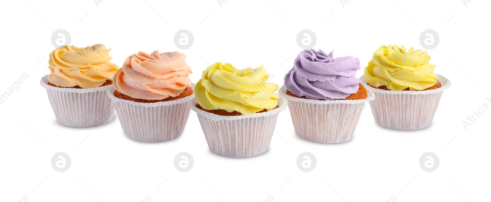 Photo of Tasty cupcakes with cream isolated on white