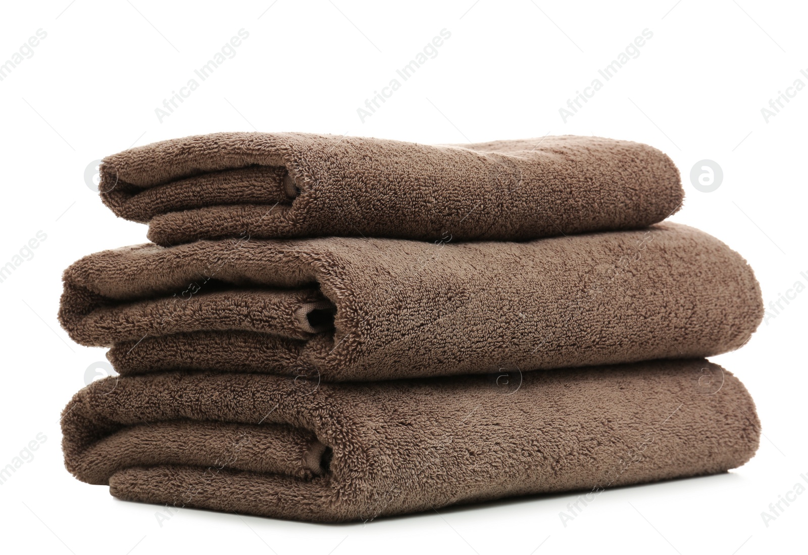 Photo of Stack of clean folded towels on white background