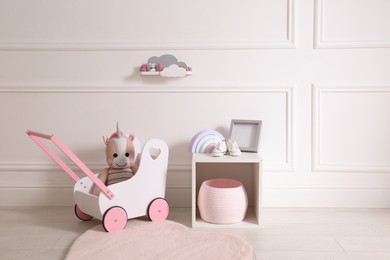 Photo of Modern child room interior with toys and different accessories