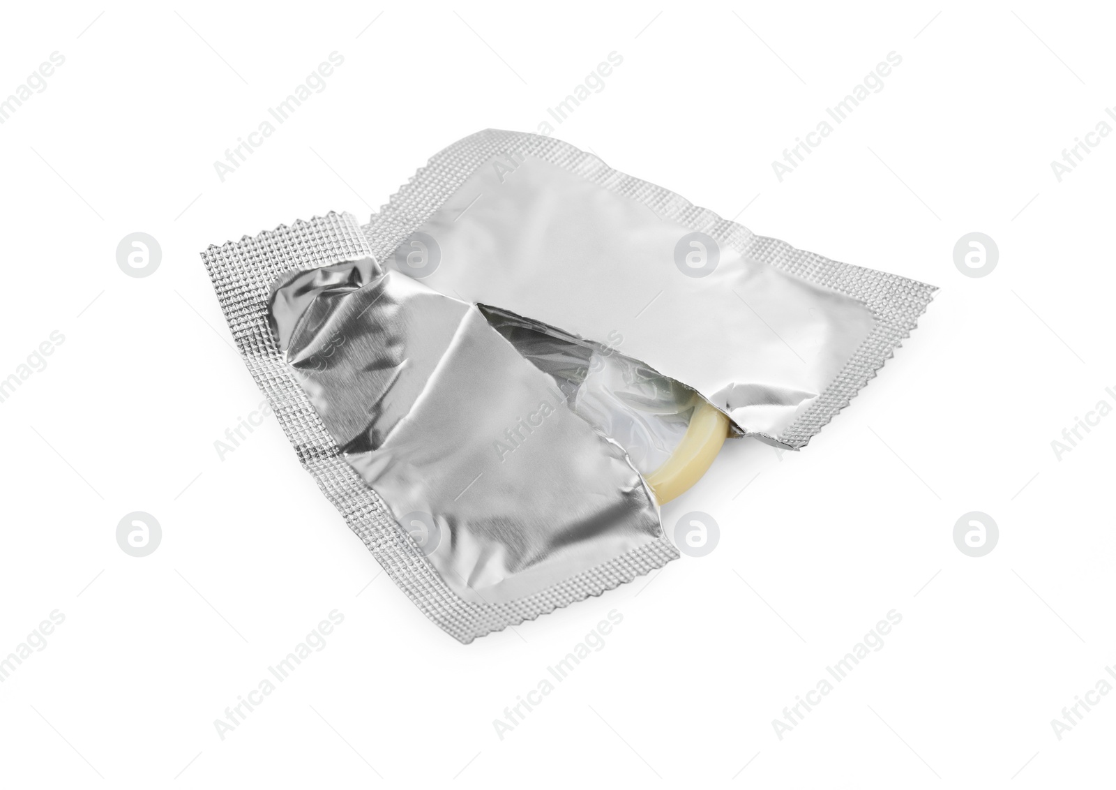 Photo of Torn package with condom isolated on white. Safe sex