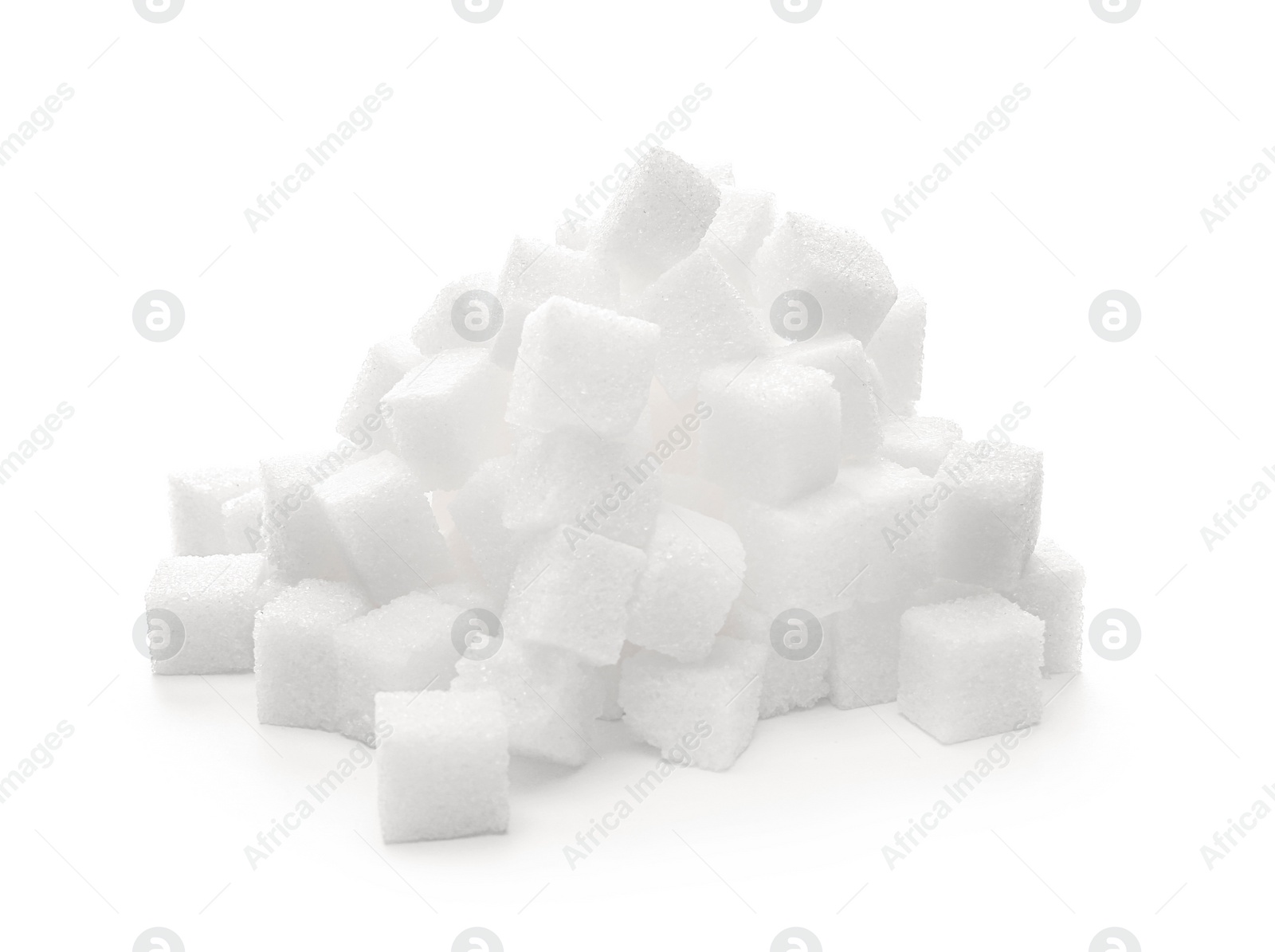 Photo of Heap of refined sugar cubes on white background