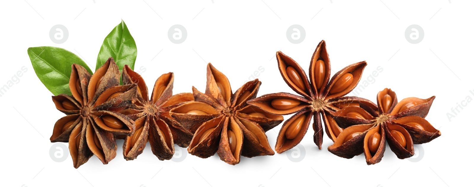 Image of Aromatic dry anise stars and green leaves on white background. Banner design