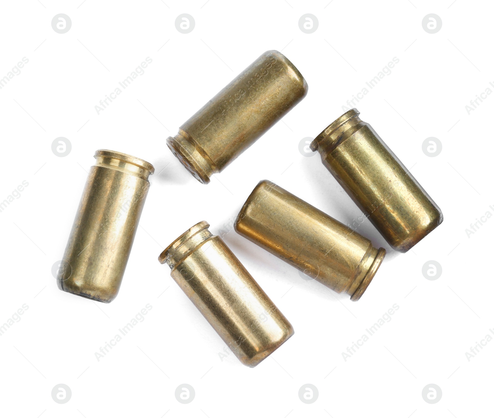 Photo of Cartridge cases isolated on white, top view. Firearm ammunition