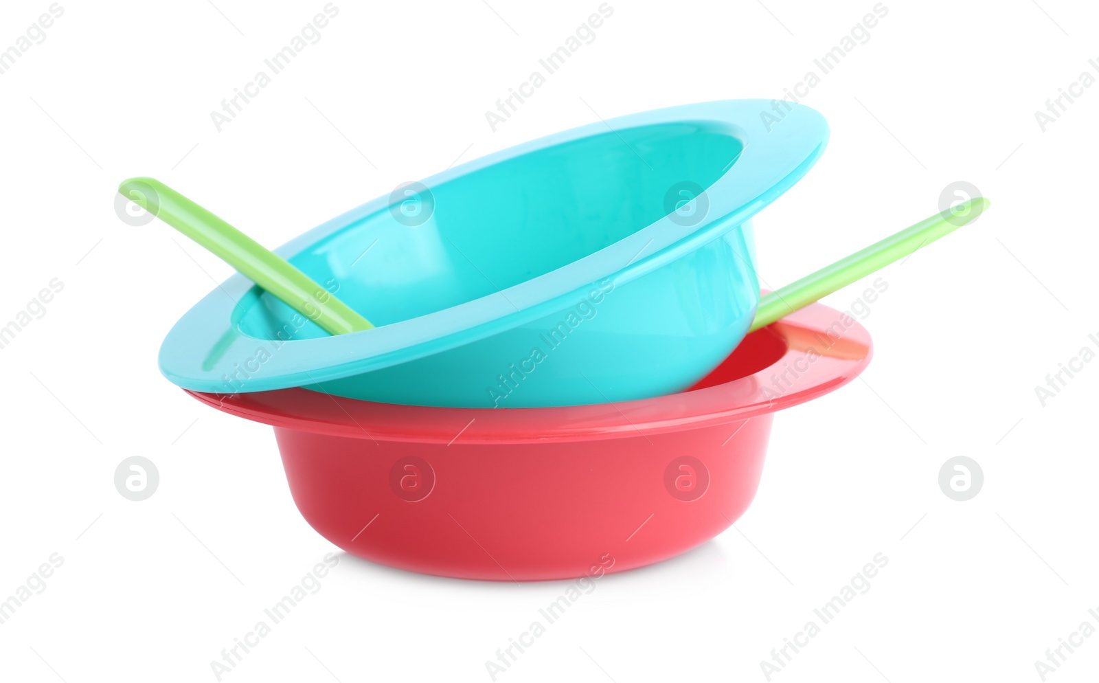 Photo of Plastic dishware isolated on white. Serving baby food