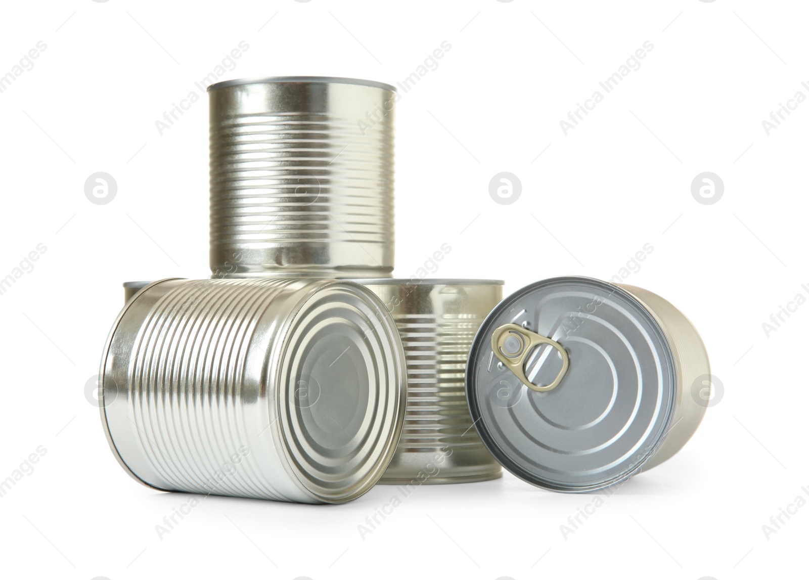 Photo of Closed tin cans isolated on white, mockup for design