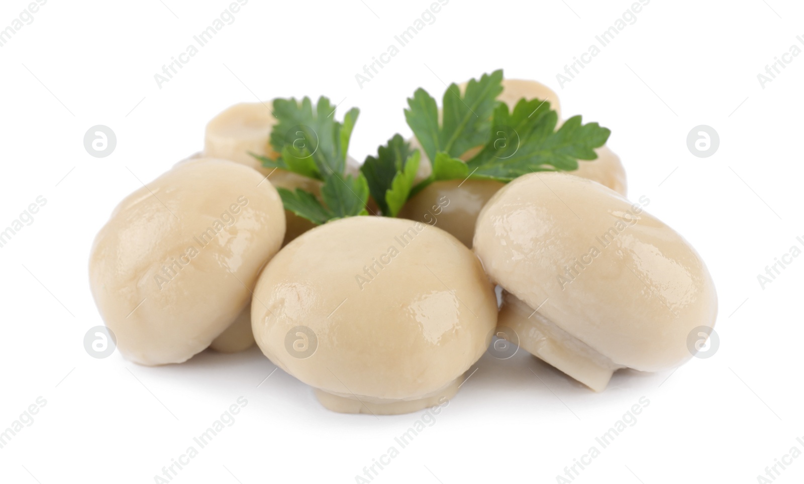 Photo of Delicious marinated mushrooms with parsley isolated on white