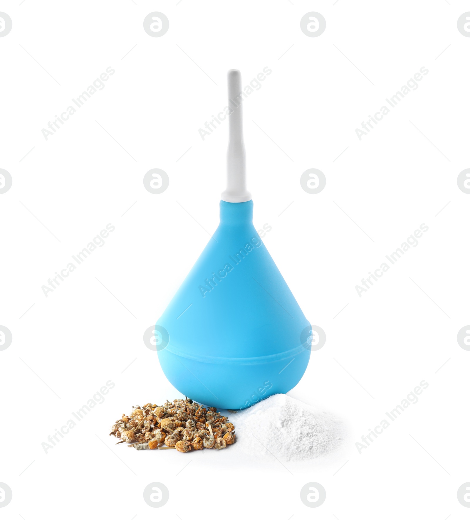 Photo of Blue enema, soda powder and dry chamomile flowers on white background